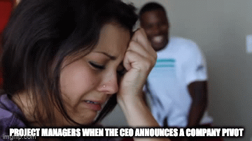 project management meme: excited ceo announcing a company pivot as a pm cries in despair